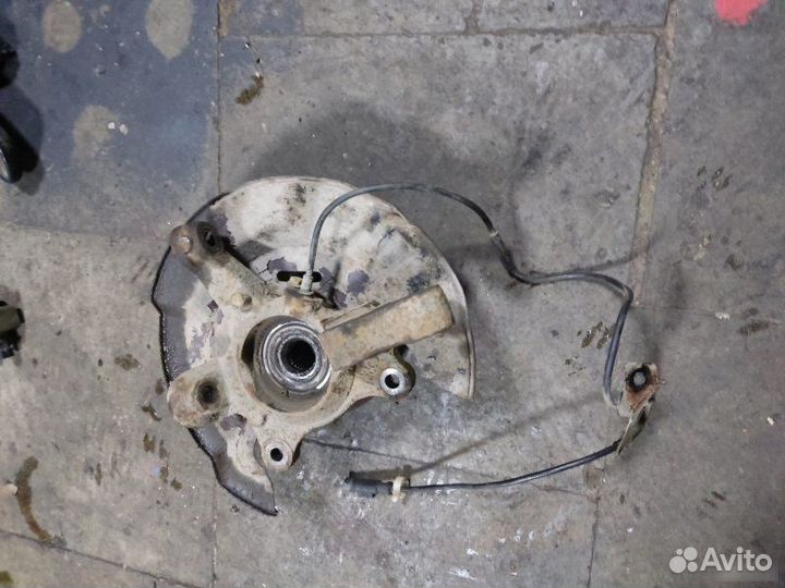 Кулак поворотный передний левый Geely Emgrand Ec7