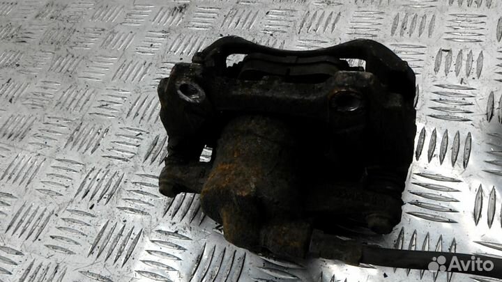 Суппорт передний левый Opel Corsa D рест. 2011