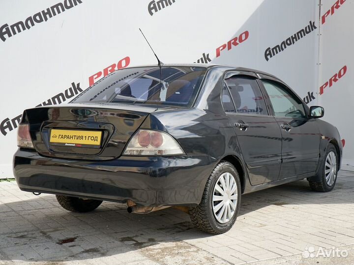 Mitsubishi Lancer 1.6 МТ, 2005, 301 429 км