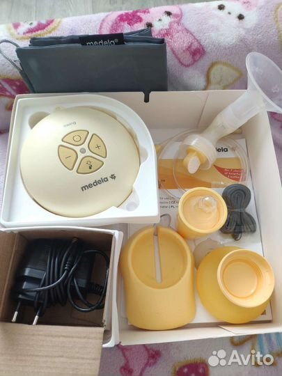 Молокоотсос medela swing электрический
