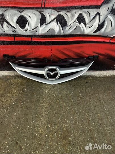 Решотка радиатора Mazda