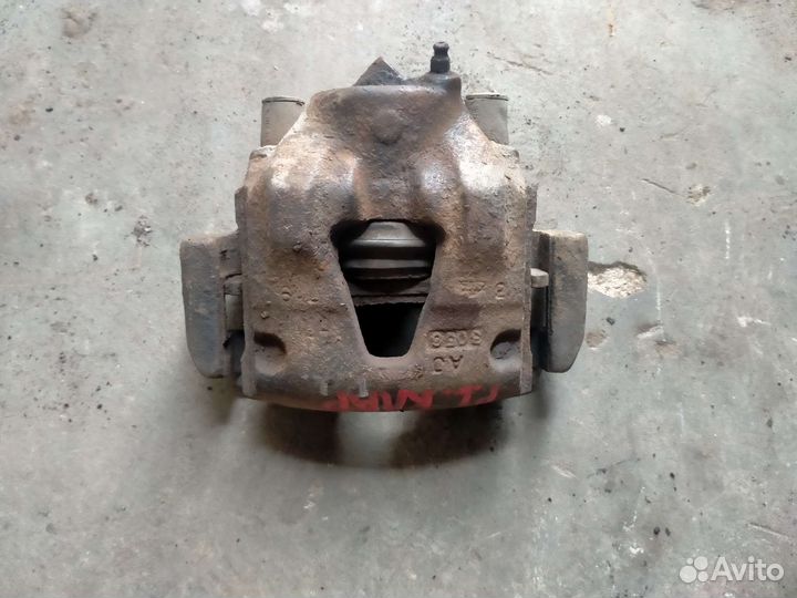 Суппорт передний kia clarus