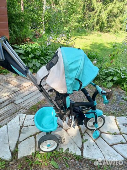 Трехколесный велосипед с ручкой