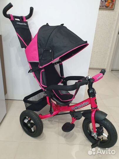 Трехколесный велосипед с ручкой