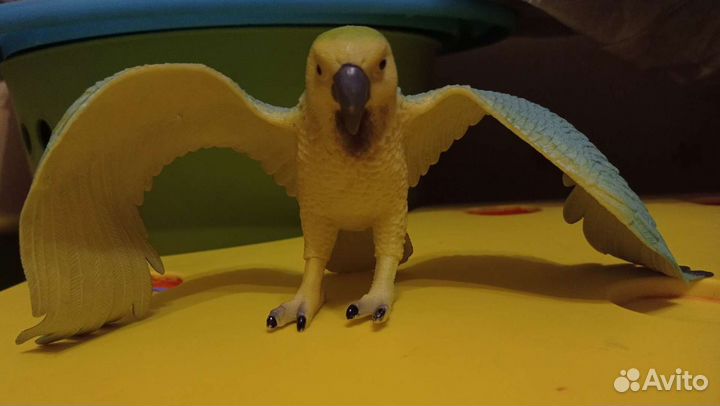 Игрушка попугай