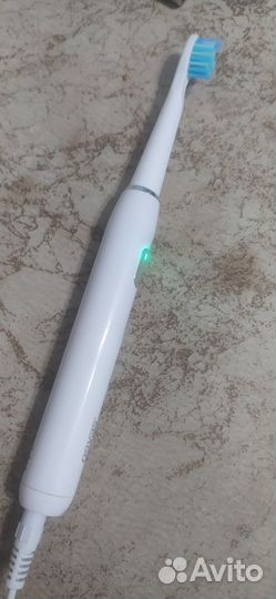 Электронная зубная щетка