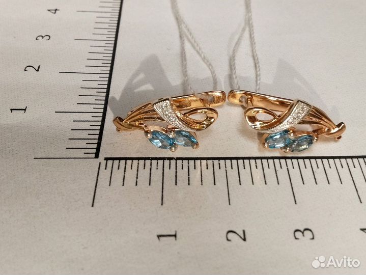 Золотые серьги с камнем