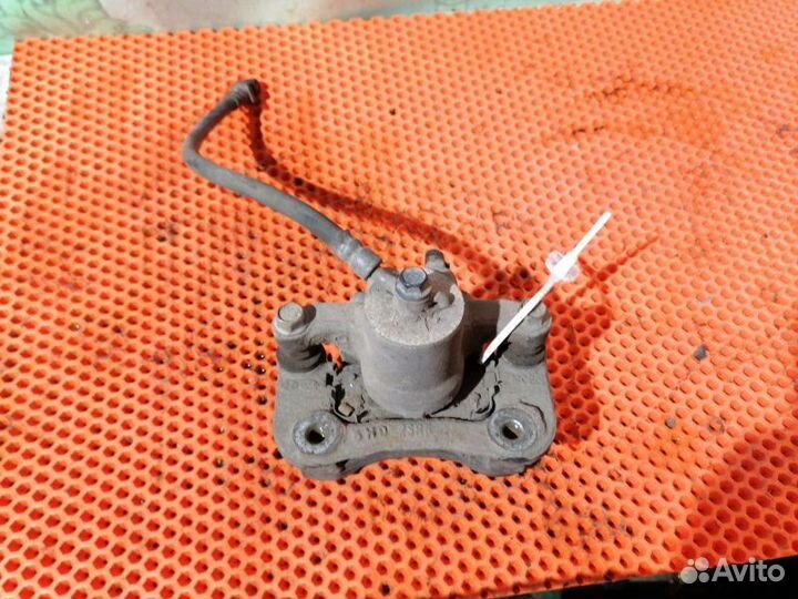 Суппорт задний левый Kia Sportage 3