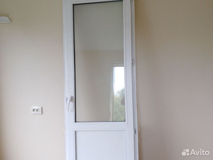 Пластиковые двери балконные