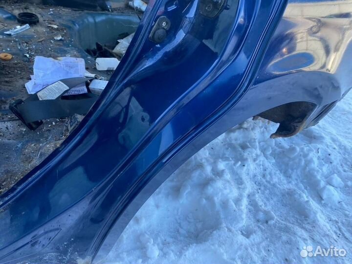 Крыло заднее левое Nissan Tiida