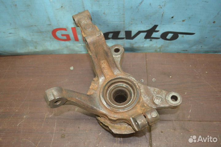 Кулак поворотный левый передний Mazda 323