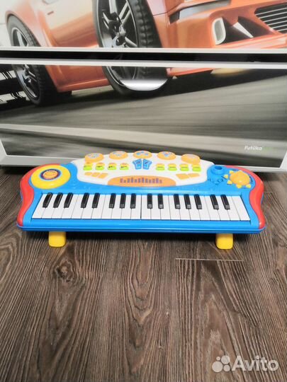 Детский игрушечный синтезатор /пианино