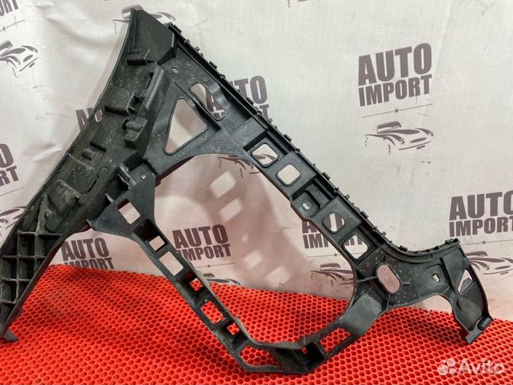 Кронштейн бампера задний левый Volkswagen Passat