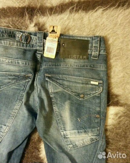 Джинсы новые