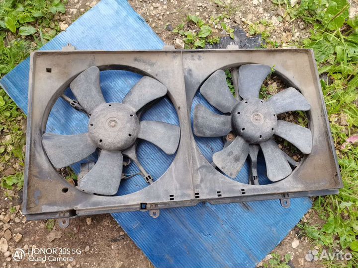 Вентилятор охлаждения лансер 9