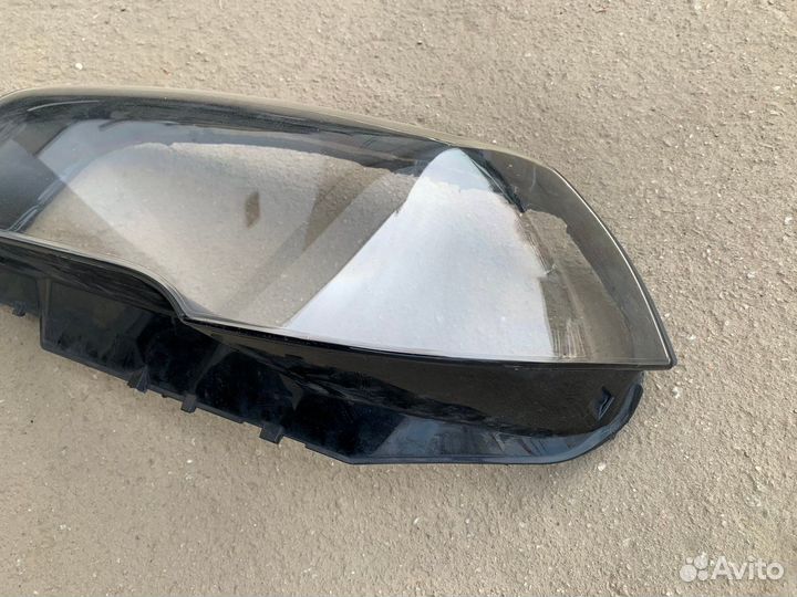 Стекло фары левой X3 E83