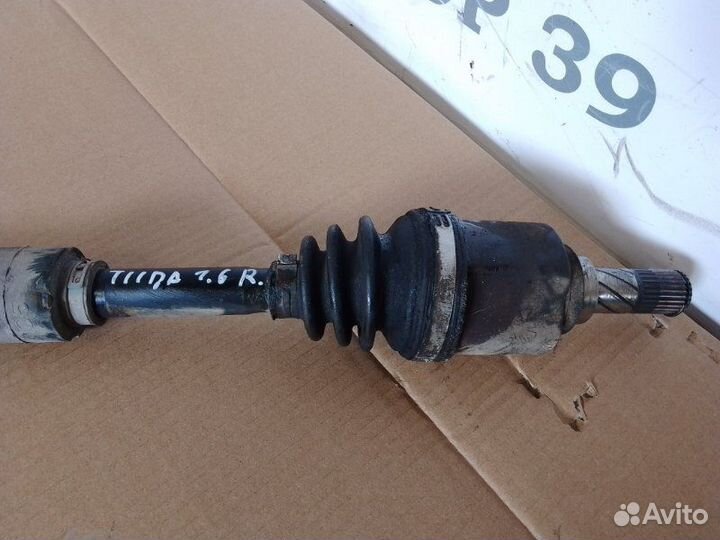 Полуось привод передний правый Nissan Tiida 1.6