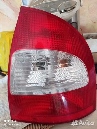 Задний правый фонарь калина седан