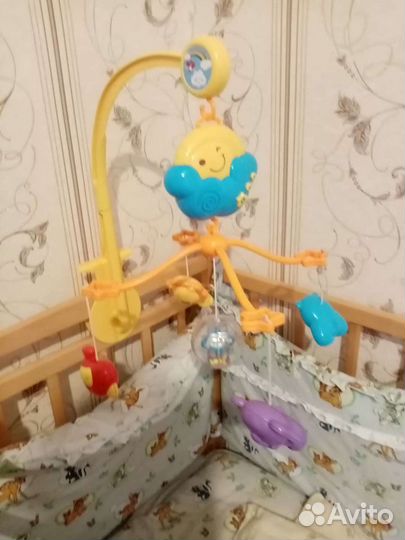 Музыкальный мобиль в кроватку