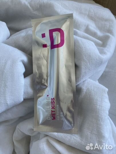 Помада для губ с эффектом увеличения