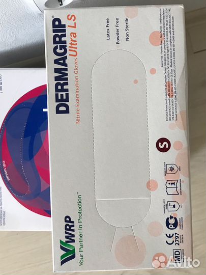 Перчатки смотровые Dermagrip 200шт в пачке