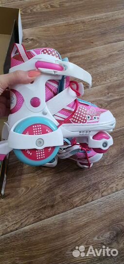 Роликовые коньки