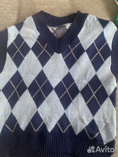 Жилет вязаный женский