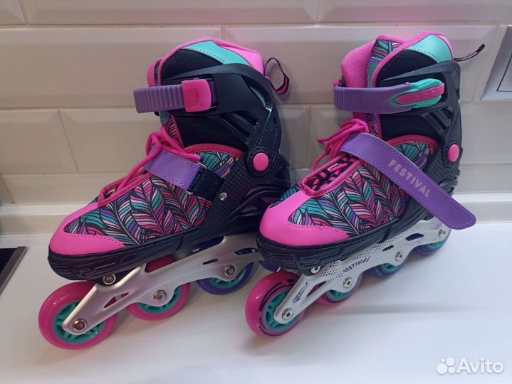 Роликовые коньки