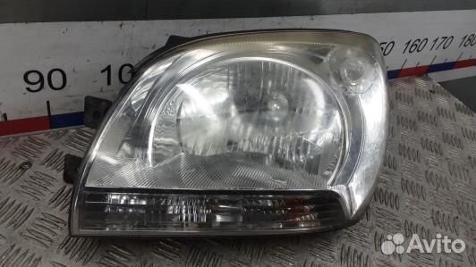 Фара левая KIA sportage 2 (SML07MR01)