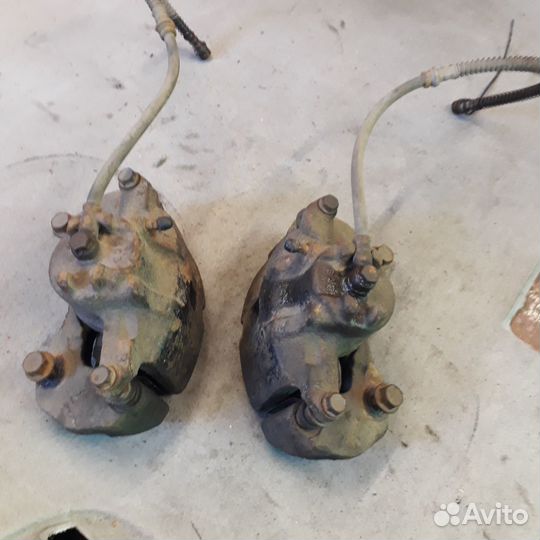 Суппорт передний левый правый Мицубиси Лансер 9