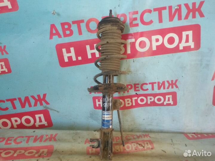 Стойка передняя левая Опель Корса