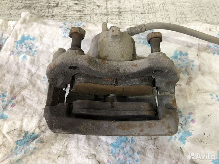 Суппорт передний Ниссан Альмера Н16