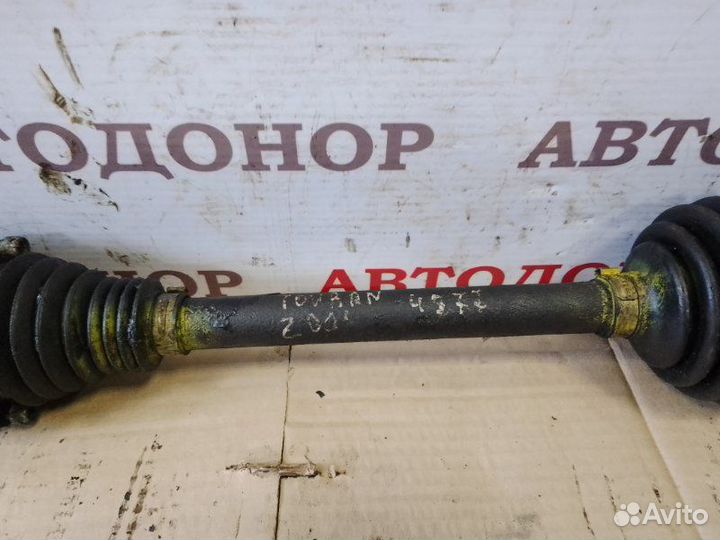 Полуось привод передний левый Volkswagen Touran