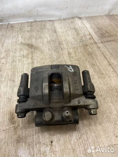 Суппорт задний правый Mitsubishi Lancer 10 CY3A