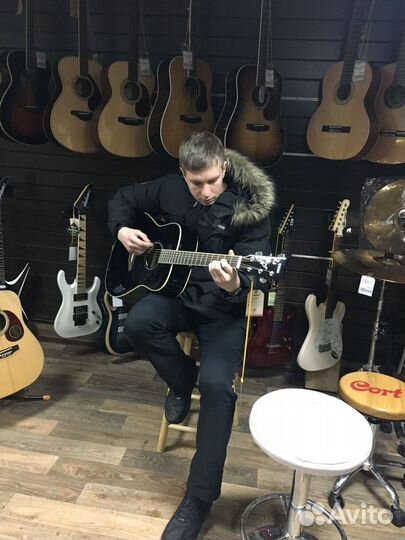 Учитель по гитаре