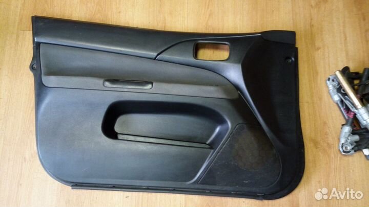 Карта двери пер.левая Мицубиси ланцер 9 до рест