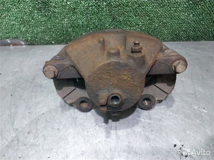 Суппорт тормозной передний правый Nissan Primera