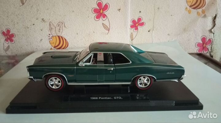 Модель автомобиля Pontiac GTO 1966 Welly 1/18