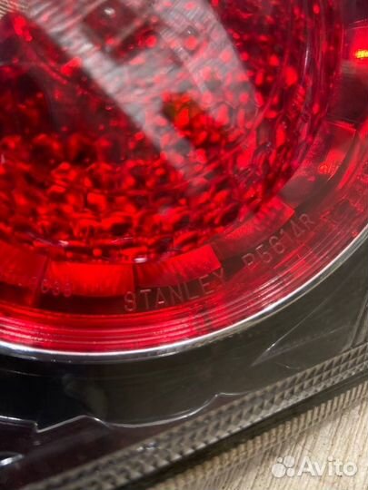 Фонарь в крышку багажника задний Mitsubishi Lancer