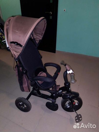 Трехколесный велосипед с ручкой