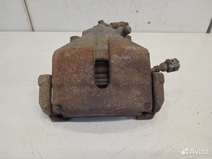 Суппорт передний левый Volkswagen Passat B6 BPY