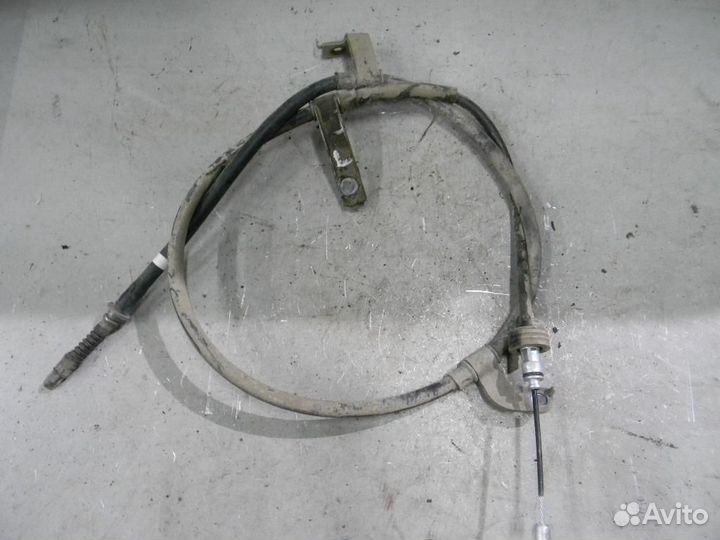 Трос ручного тормоза левый Solaris
