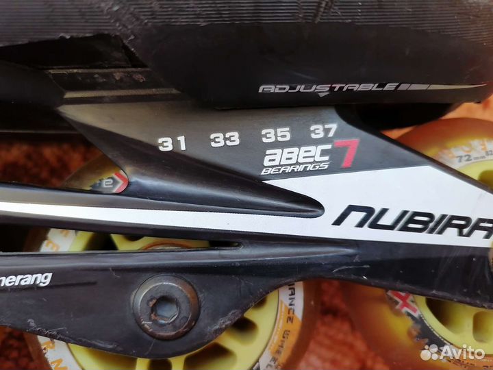 Роликовые коньки