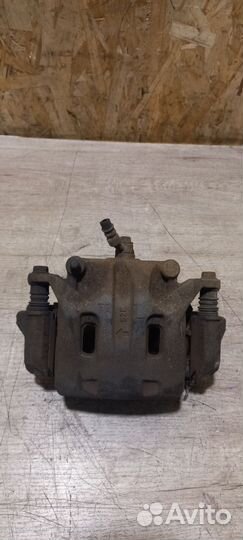 Суппорт передний левый Nissan Pathfinder R51 2.5