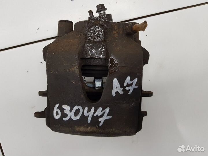 Суппорт передний левый (Skoda Octavia)