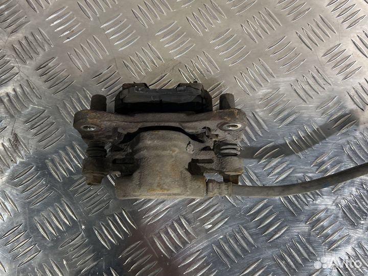 Тормозной суппорт задний mitsubishi lancer 10