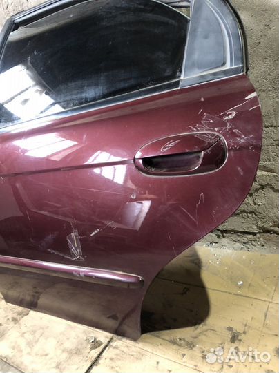 Задняя левая дверь Kia Spectra