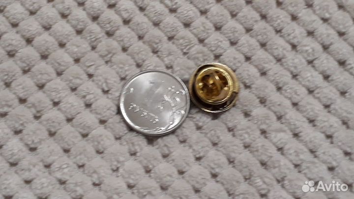 Маленький тяжелый знак Путин