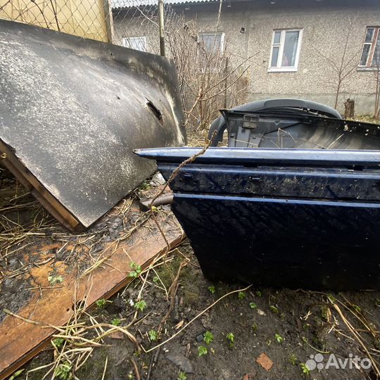 Задний бампер е38