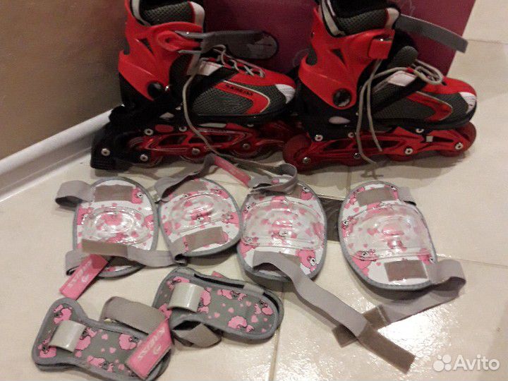 Коньки роликовые